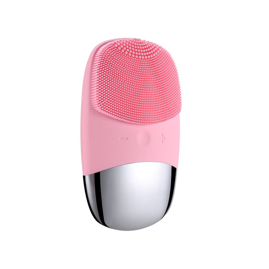 Mini electric silicone face cleansing brush in pink with soft bristles and ergonomic design for deep pore cleansing and facial massage.