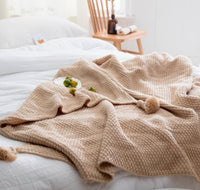 Nordic fringed knit ball blanket