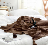 Nordic fringed knit ball blanket