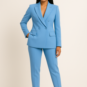 Women's casual business suit with blazer and slim fit trousers in blue, featuring notched lapels and double-breasted design for a confident, modern look.