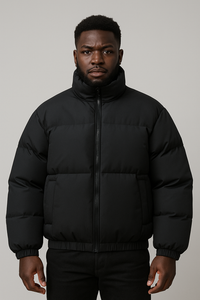 Man wearing a black Casual Fashion Gradient cotton puffer coat with a front zipper and high collar.