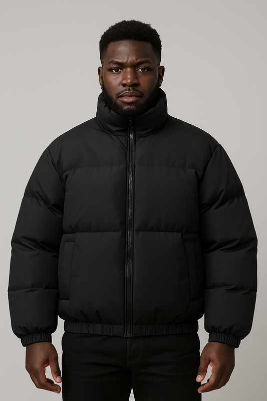 Man wearing a black Casual Fashion Gradient cotton puffer coat with a front zipper and high collar.
