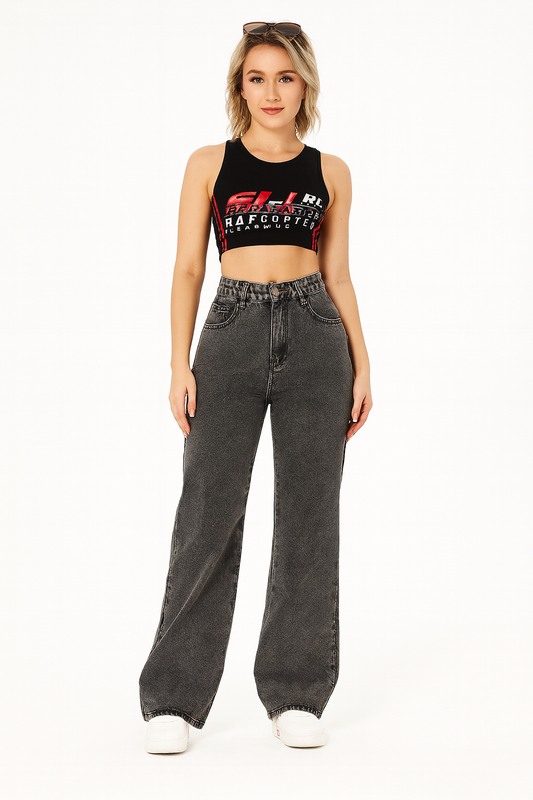 Woman wearing high waist straight loose black casual jeans with a relaxed fit and white sneakers