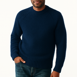 Men’s pullover sweater in navy blue with classic round neck, soft knitted fabric, worn with jeans for casual winter style