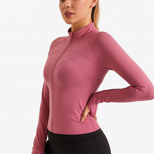 Woman wearing a fitted pink Double Chest Line Sports Jacket with a front zipper and black leggings.
